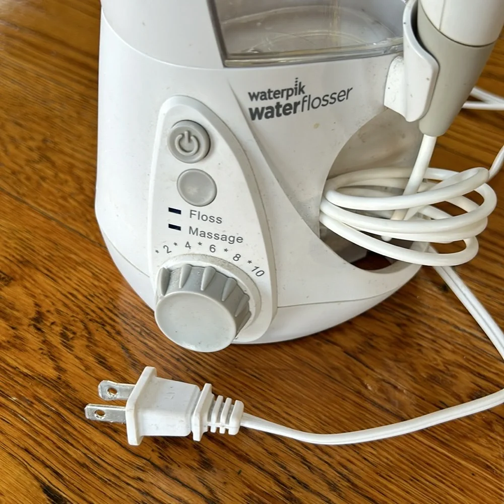 Waterpik brand water flosser. Used but great condition. No personal attachments